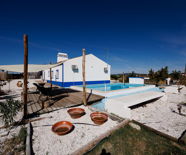 House, deck and pool from garden