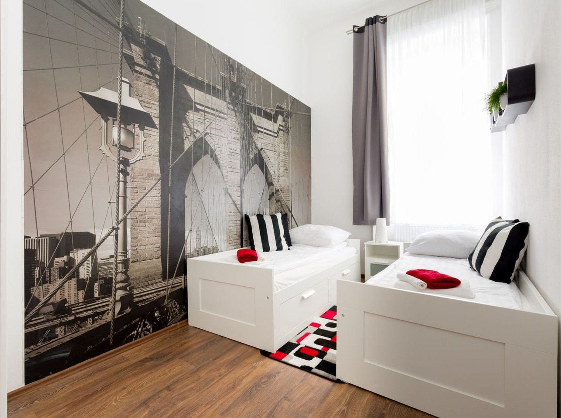 Twin bedroom with Brooklyn Bridge mural