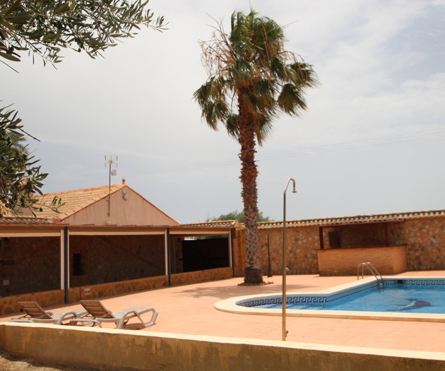 Pool with terrace lounge chairs