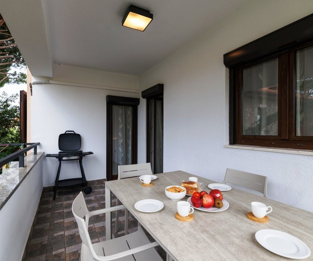 Balcony with grill and table