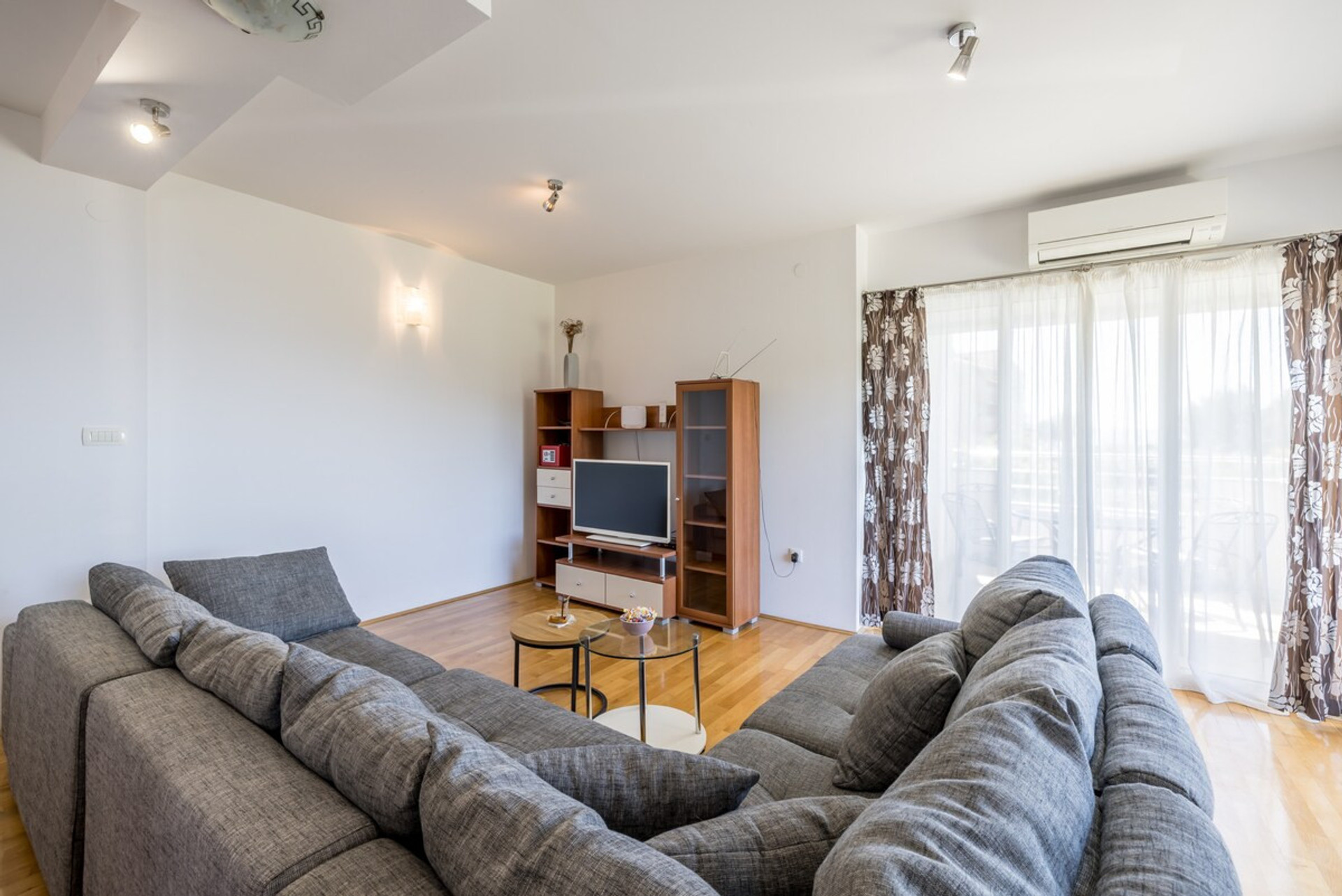 Spacious living room with terrace access