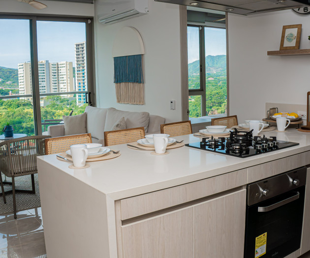 Kitchen island with cooktop and oven