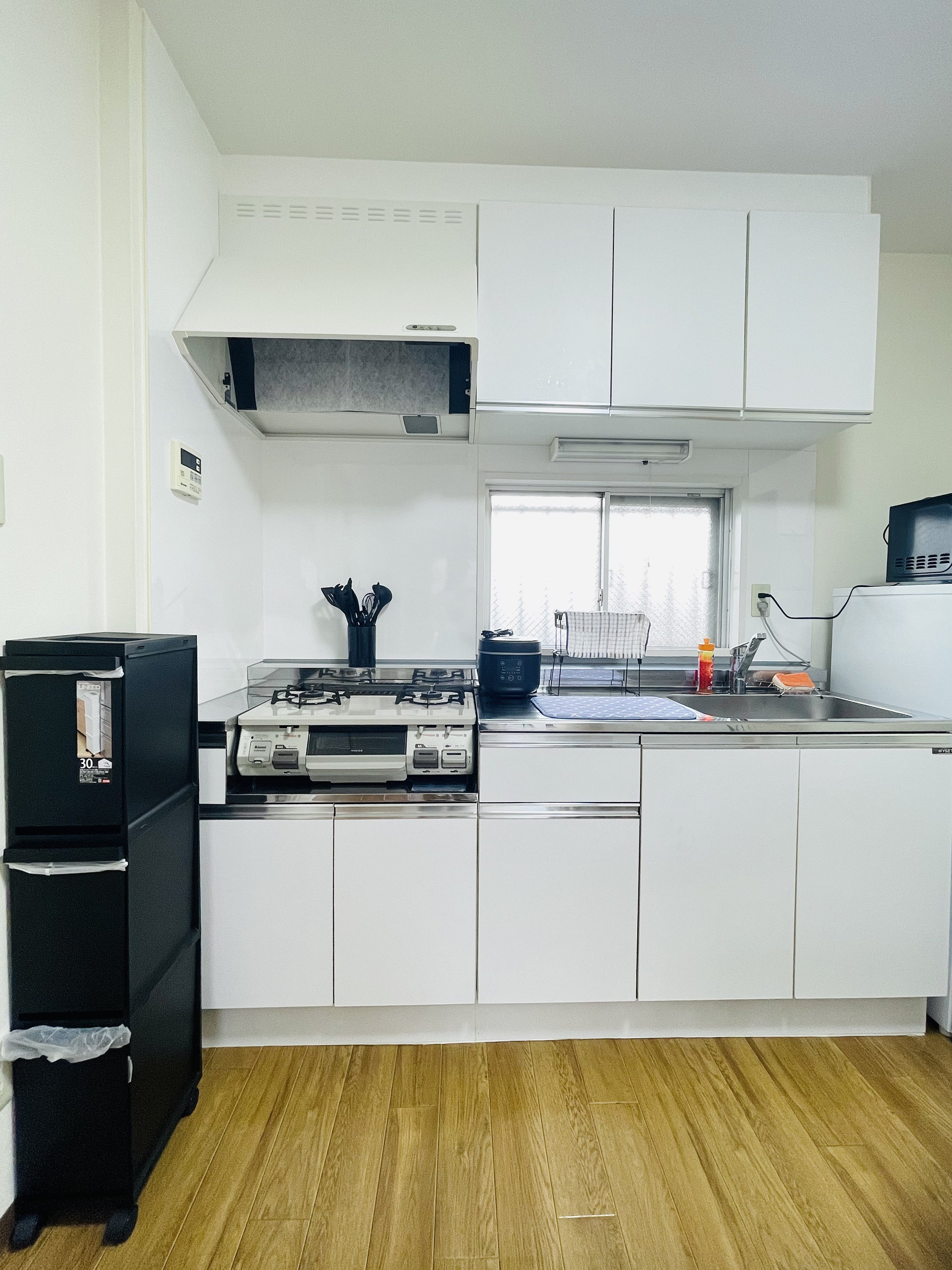 White kitchen with gas stove