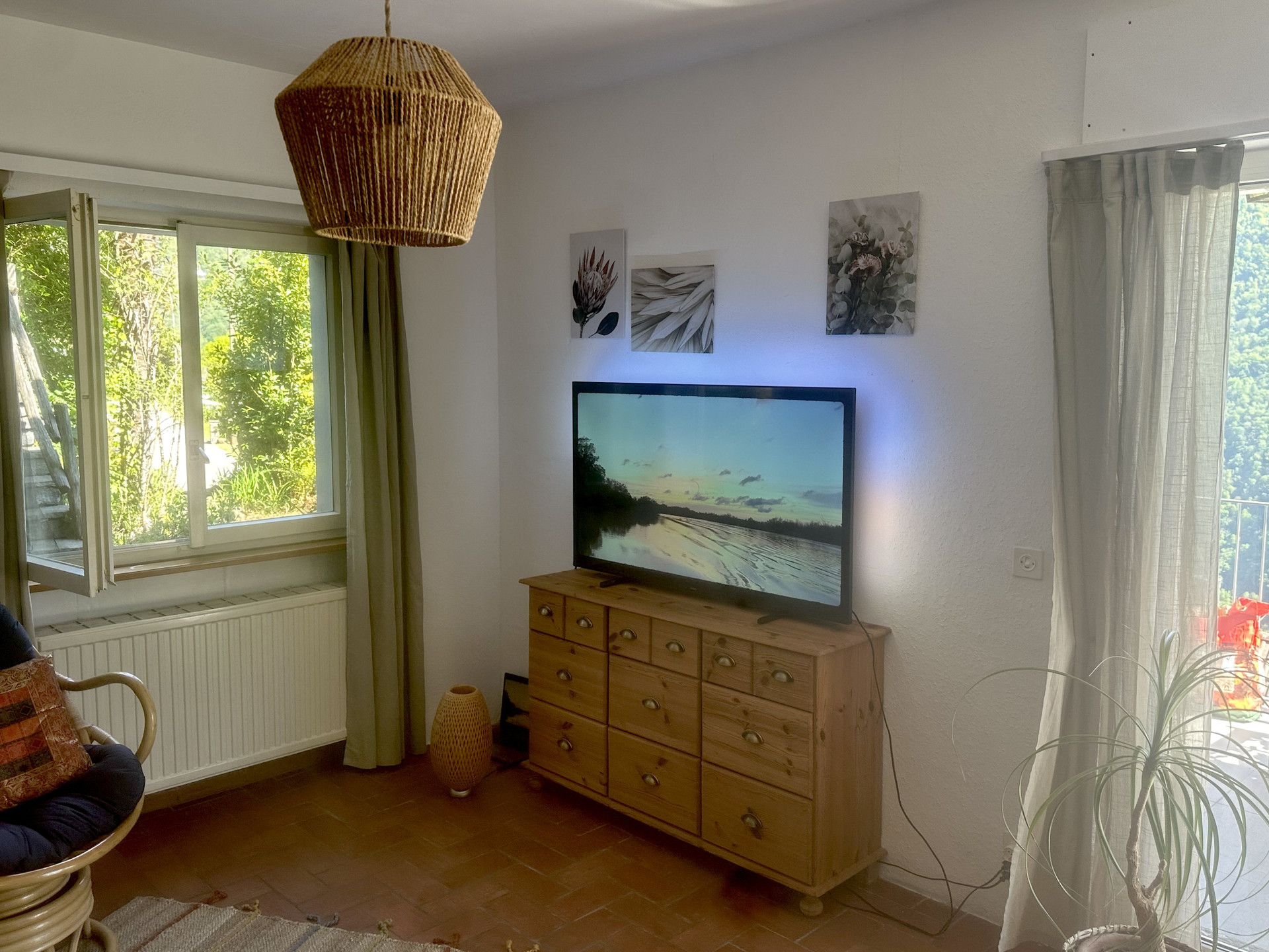Living room with TV and dresser