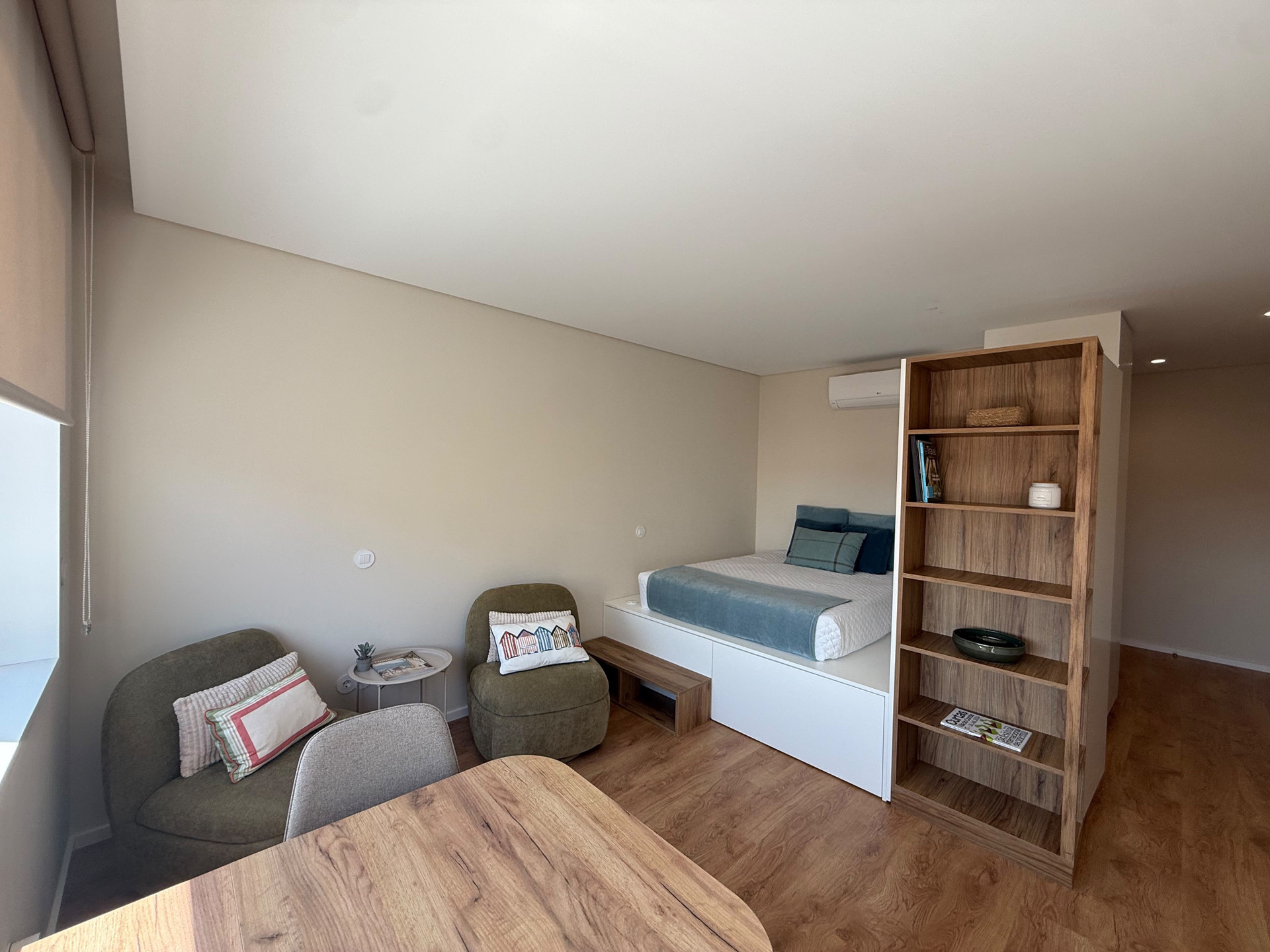 Bedroom with bed and shelving