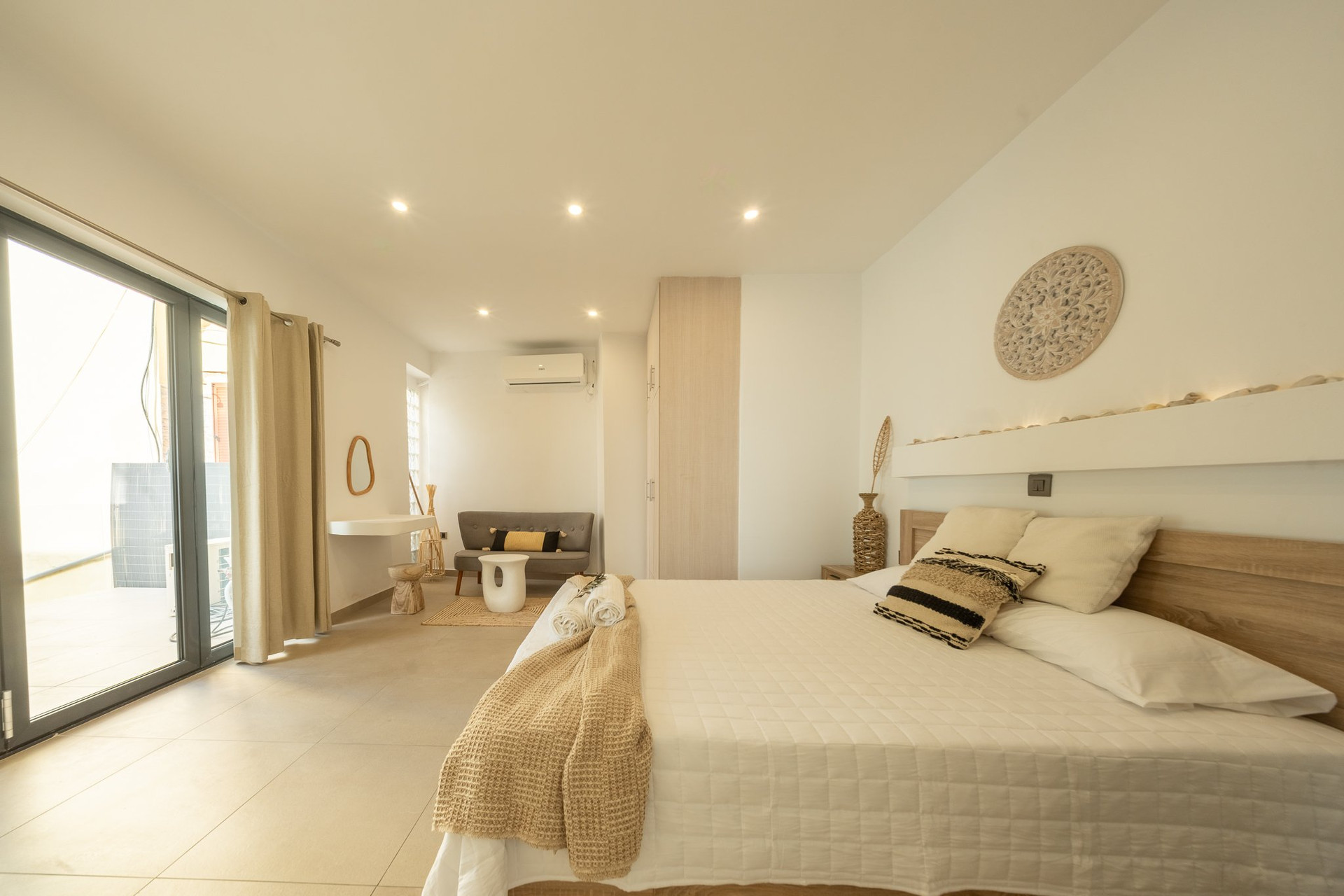 Spacious bedroom with large bed