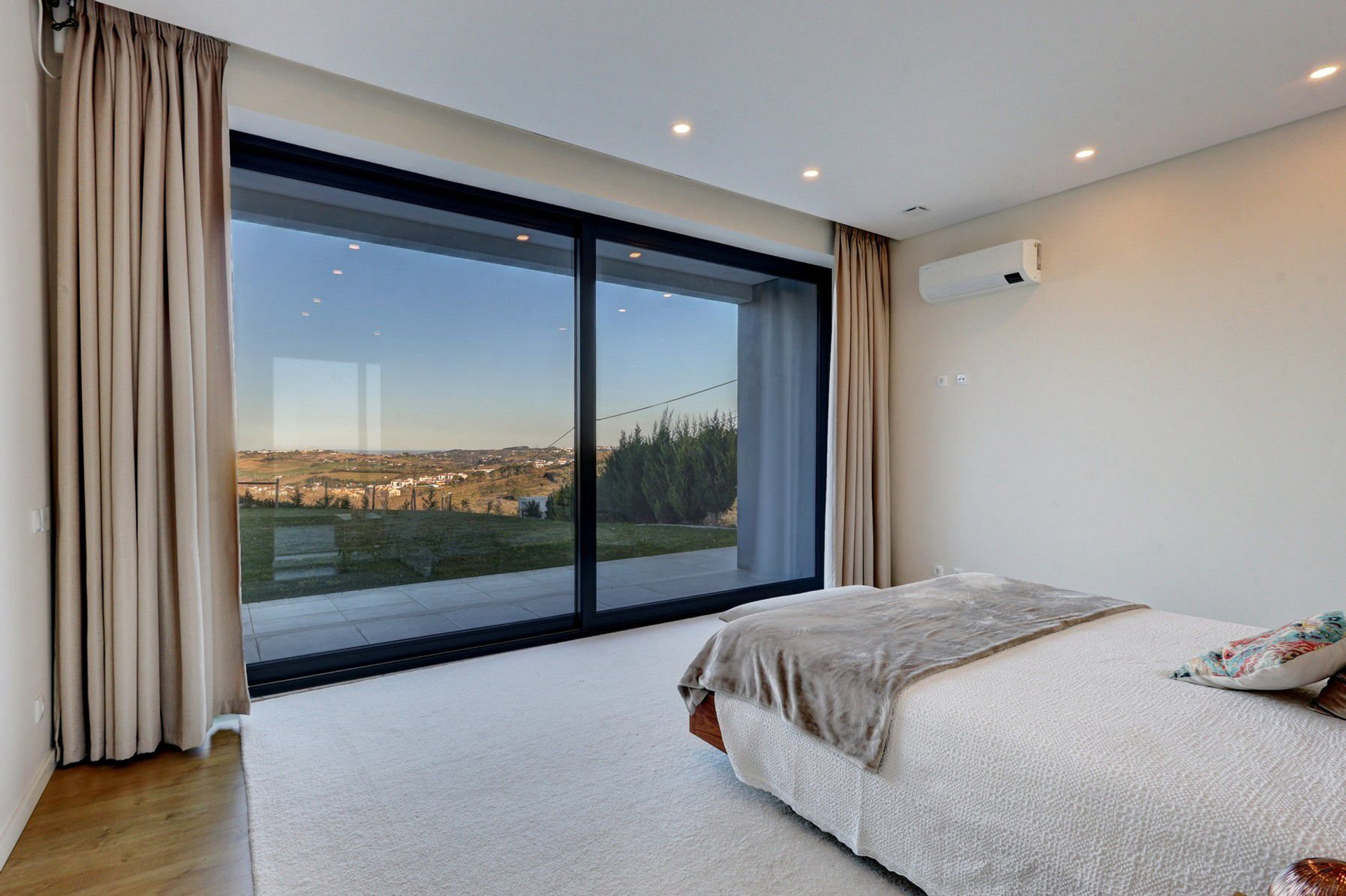Bedroom with floor-to-ceiling windows