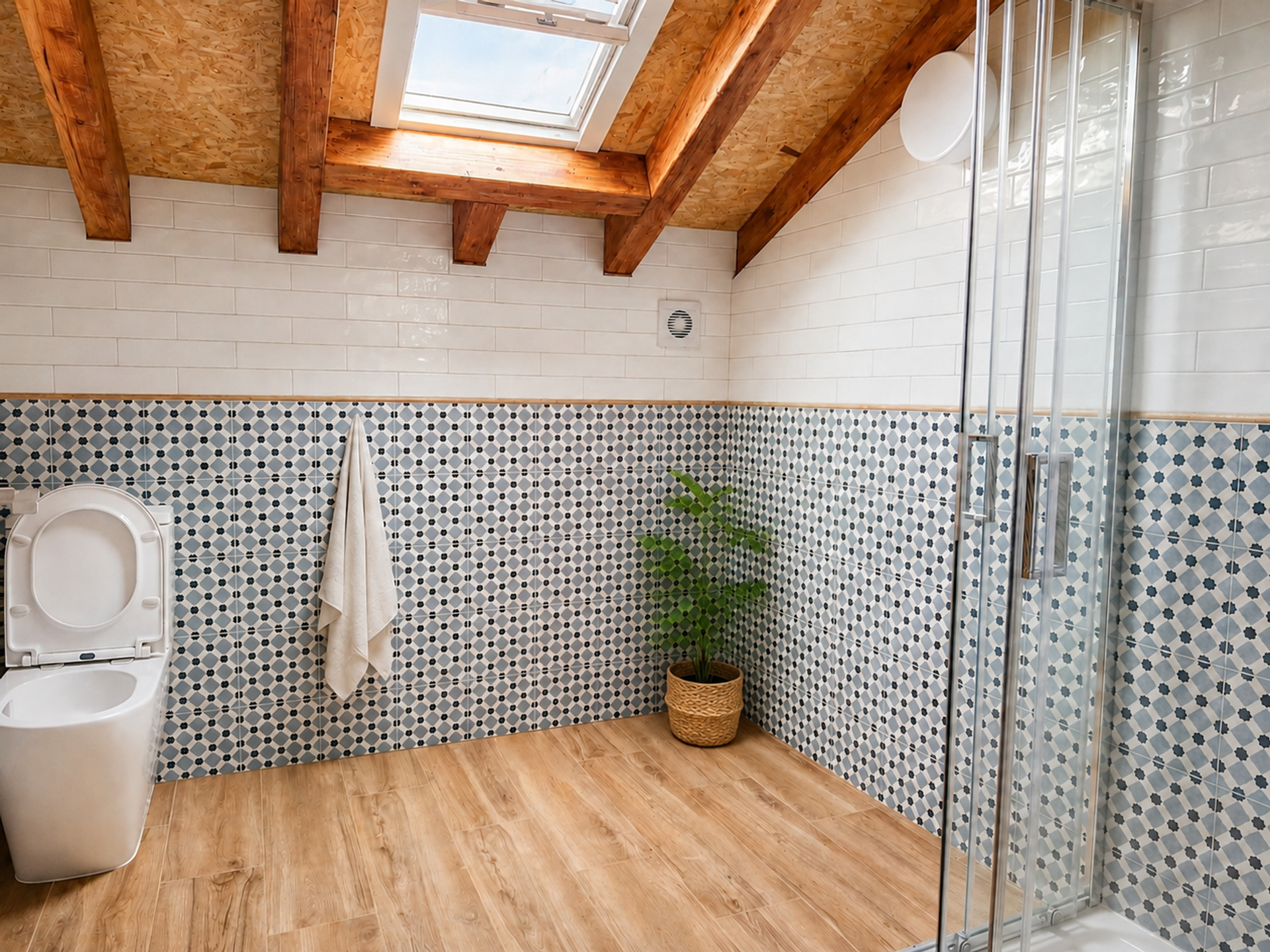 Attic bathroom with skylight and shower