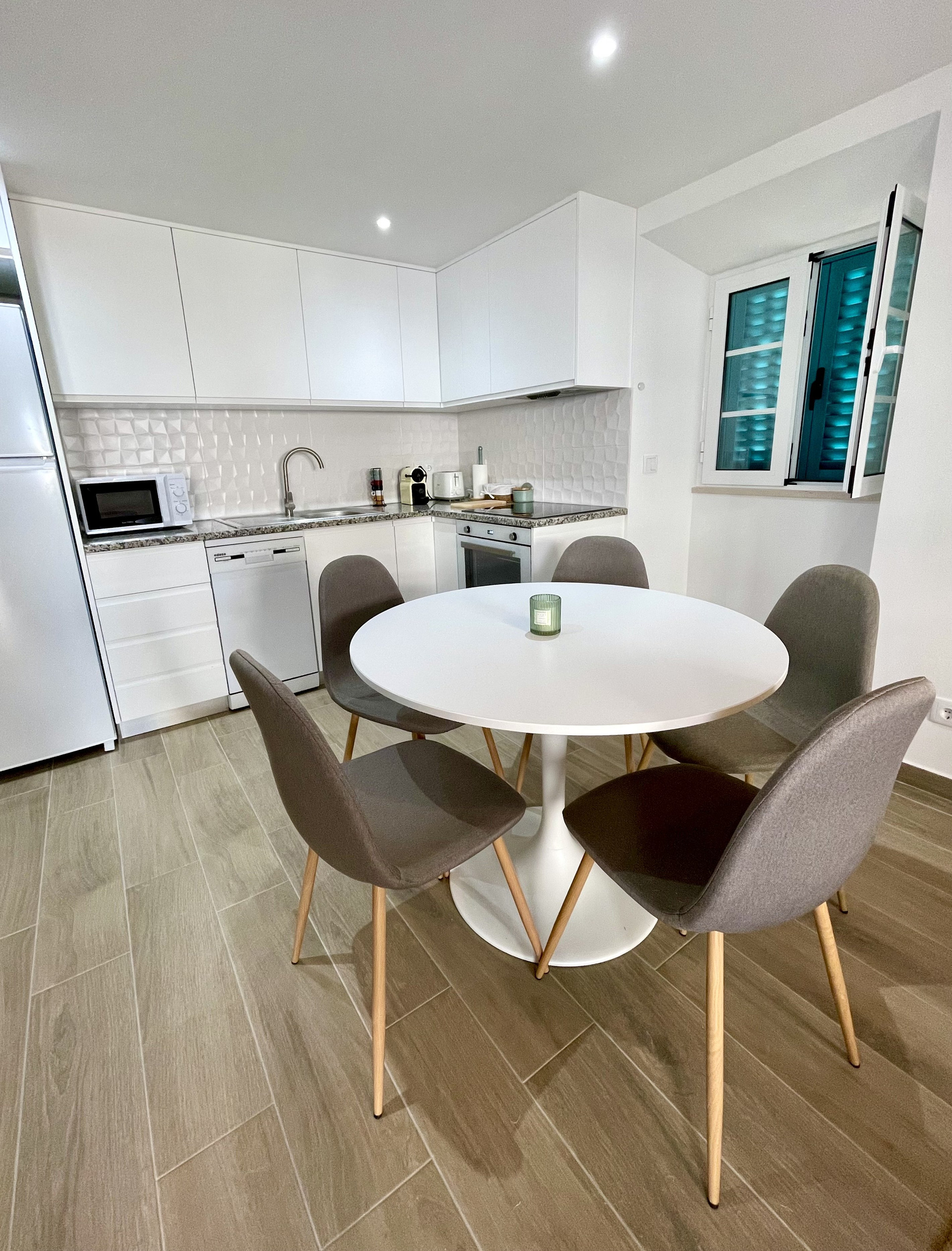 Kitchen with dining table and chairs