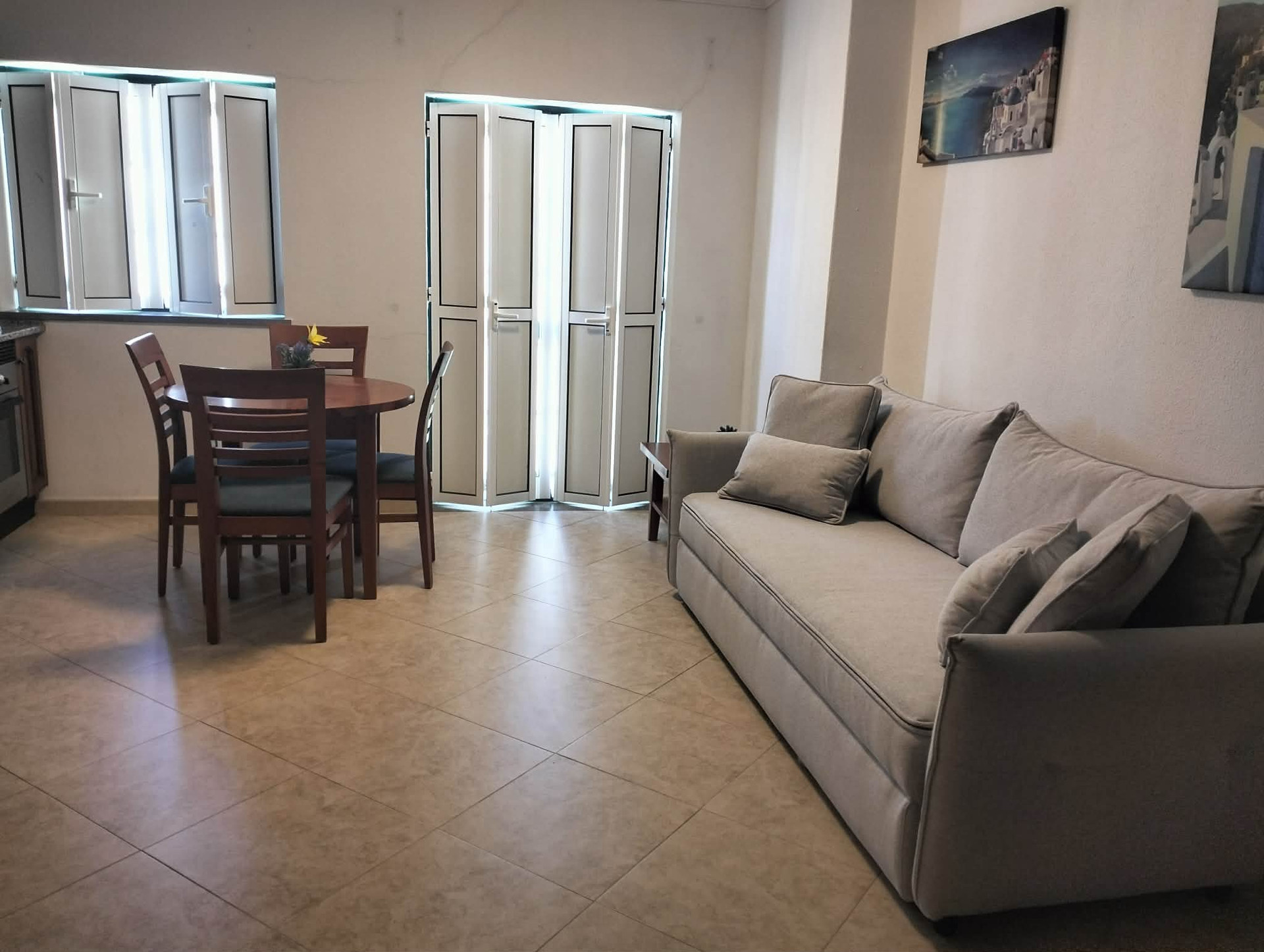 Living room with sofa and dining table
