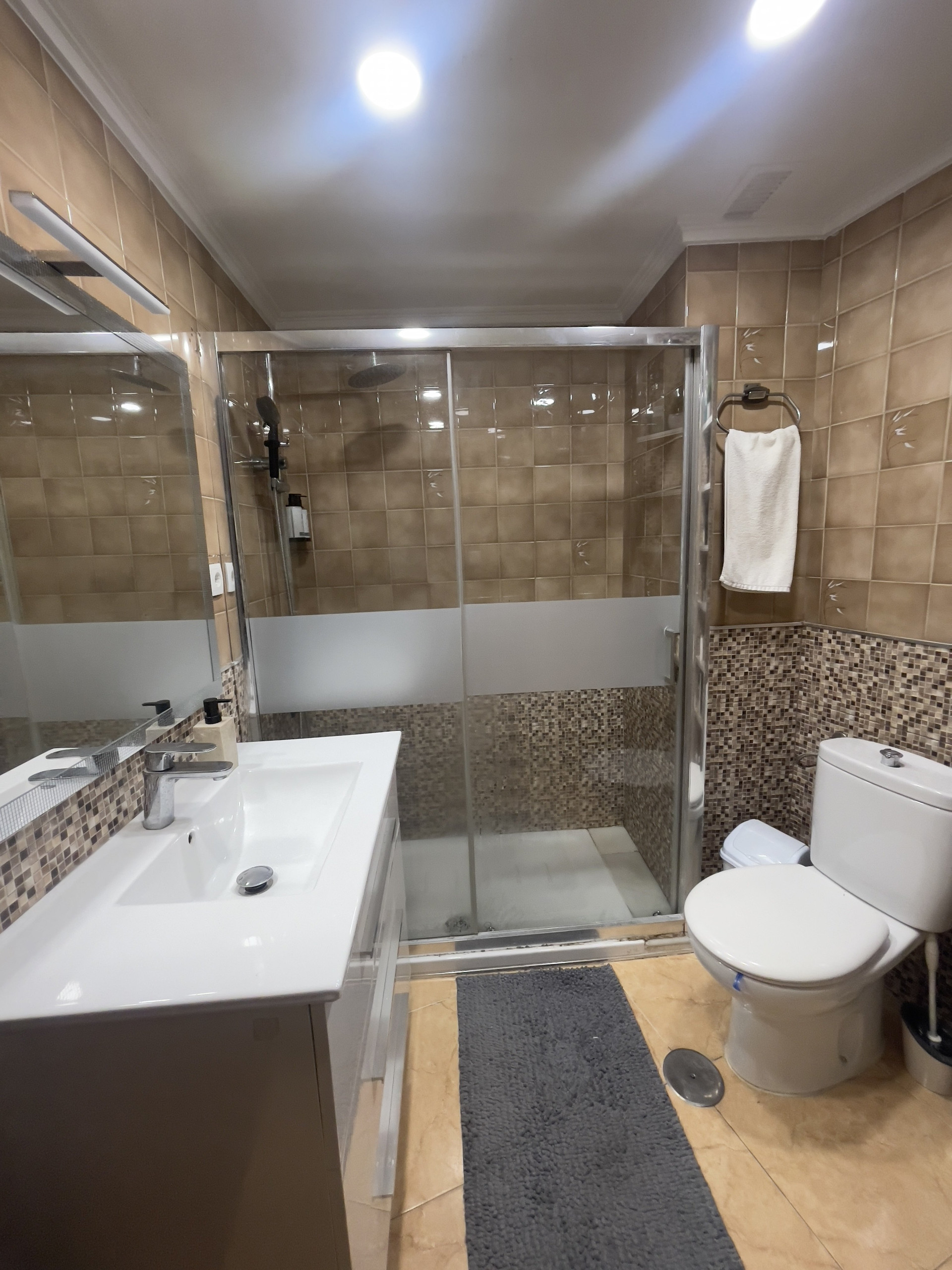 Bathroom with glass shower enclosure