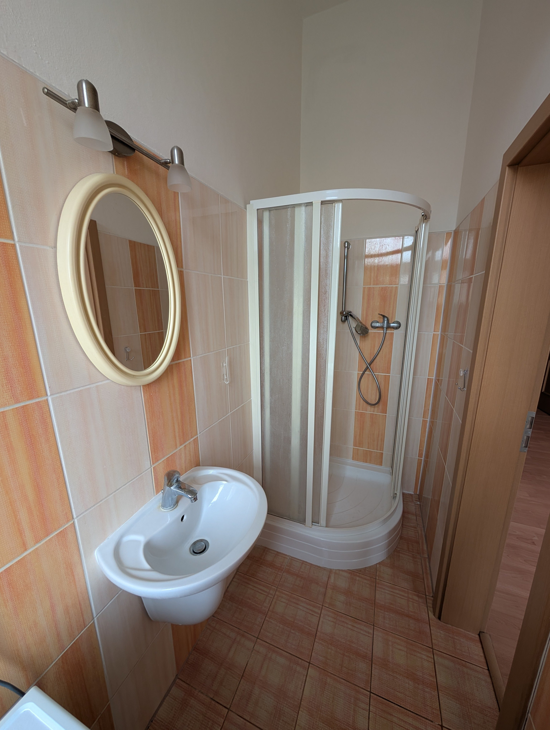 Bathroom with shower and sink