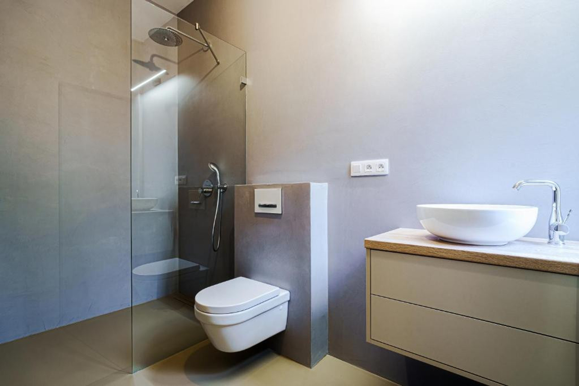 Bathroom with glass shower and sink