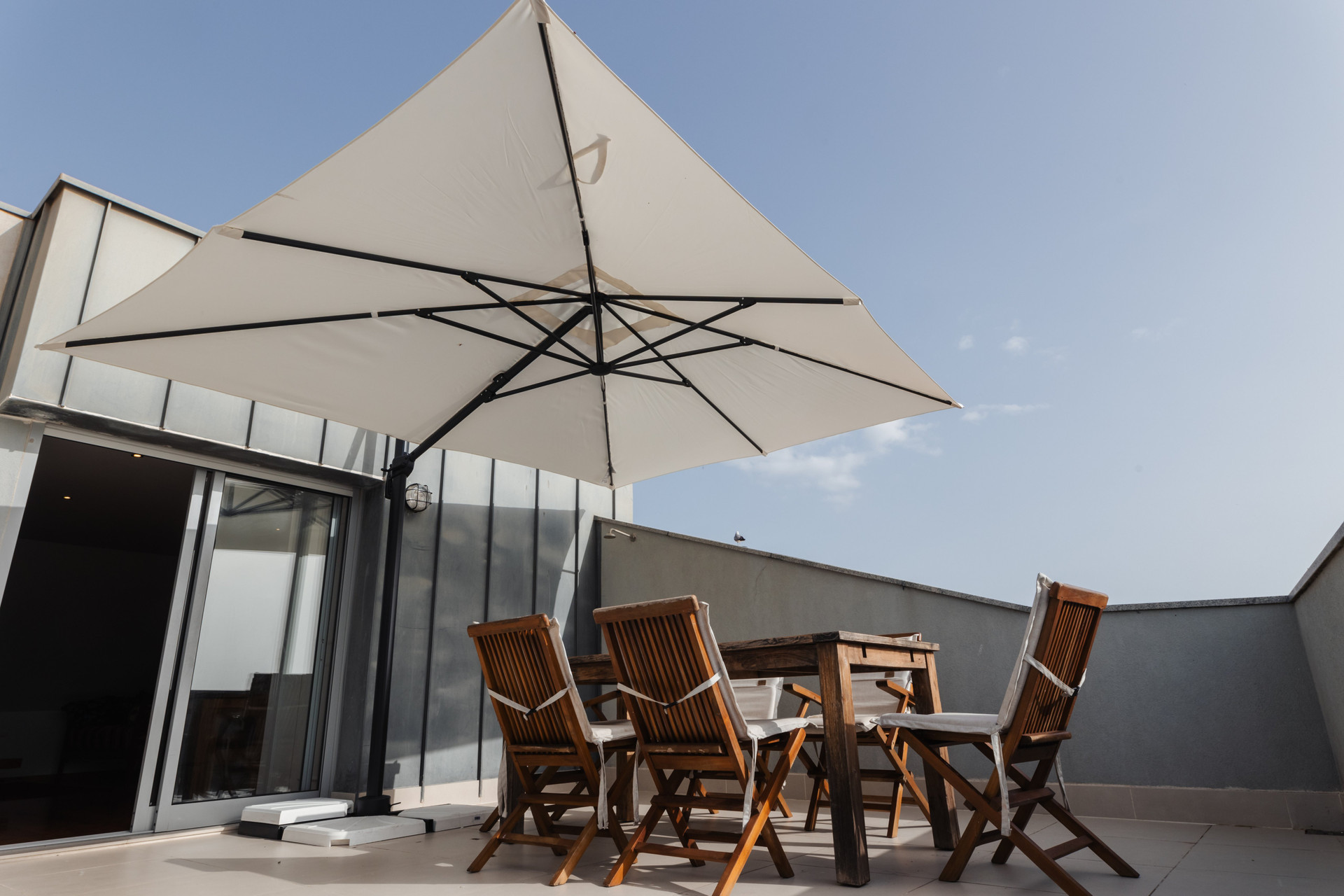Rooftop terrace with dining table
