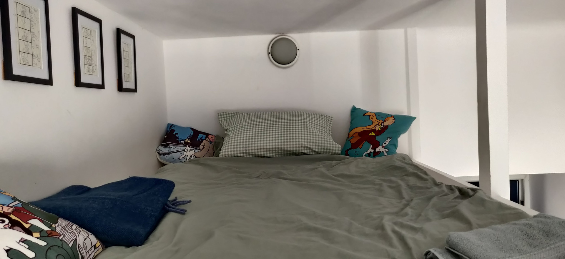 Loft bed with cozy bedding