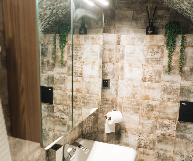 Bathroom sink under sloped ceiling
