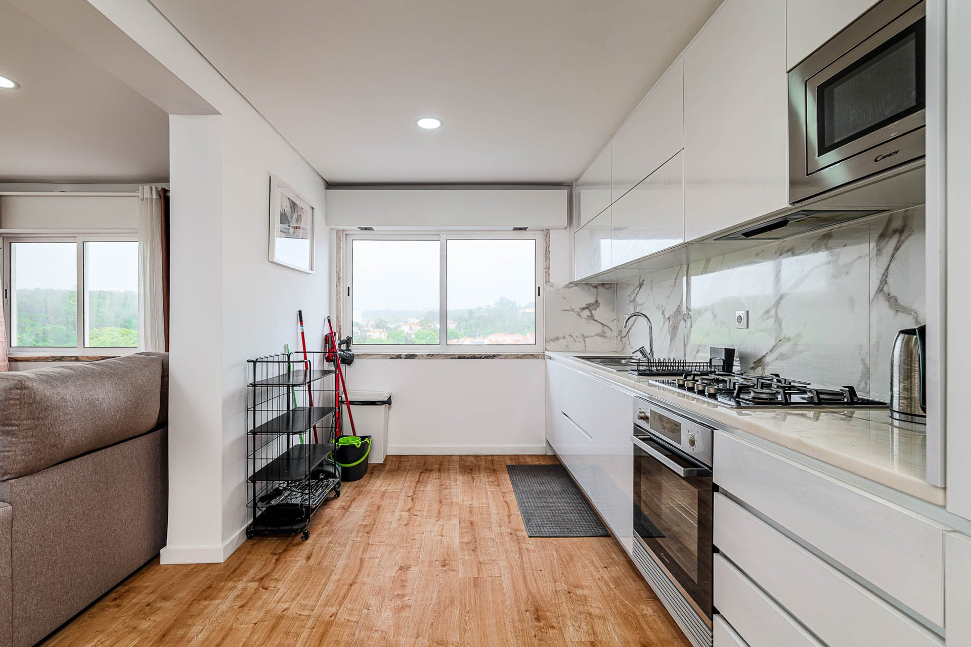 Open kitchen with marble backsplash