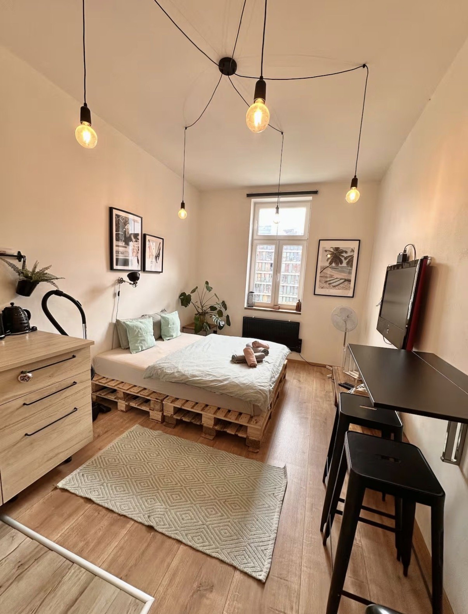 Bright studio room pallet bed desk
