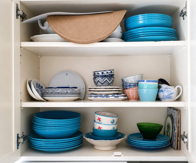 Cabinet with colorful dishware