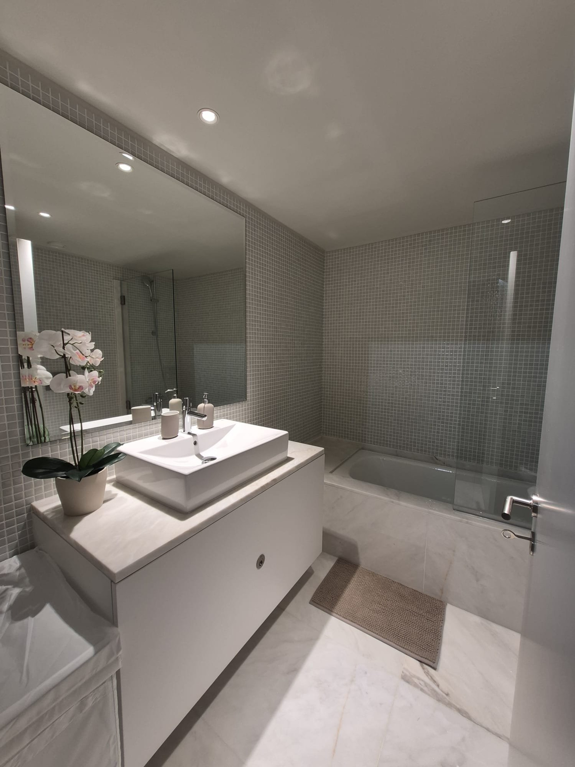 Bathroom with tub and sink