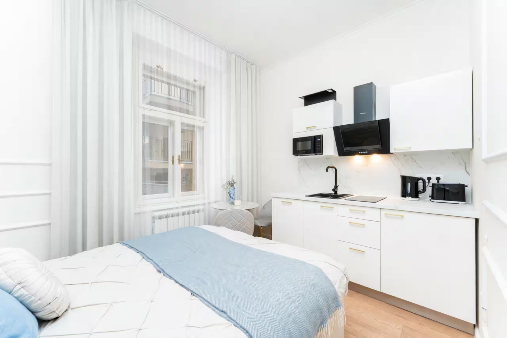 Studio bed and kitchen view