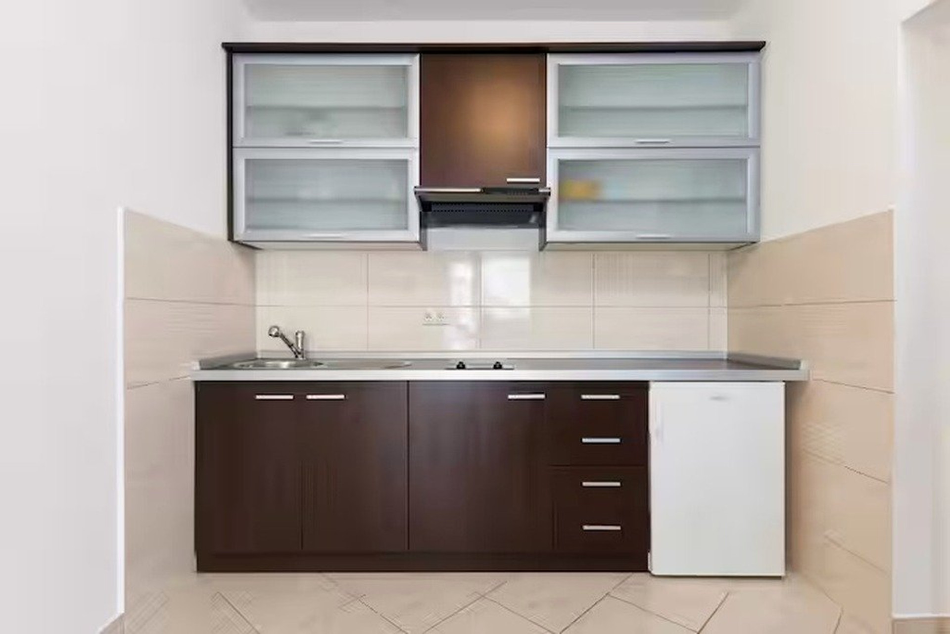 Kitchen with dark cabinets