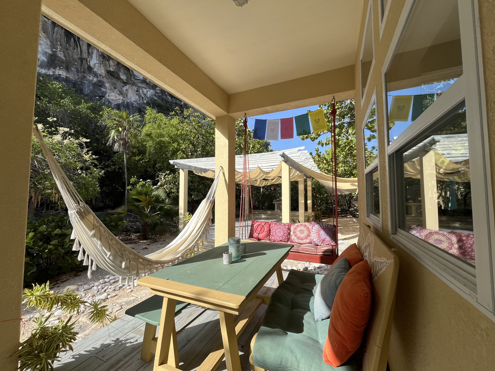 Covered porch with hammock and seating