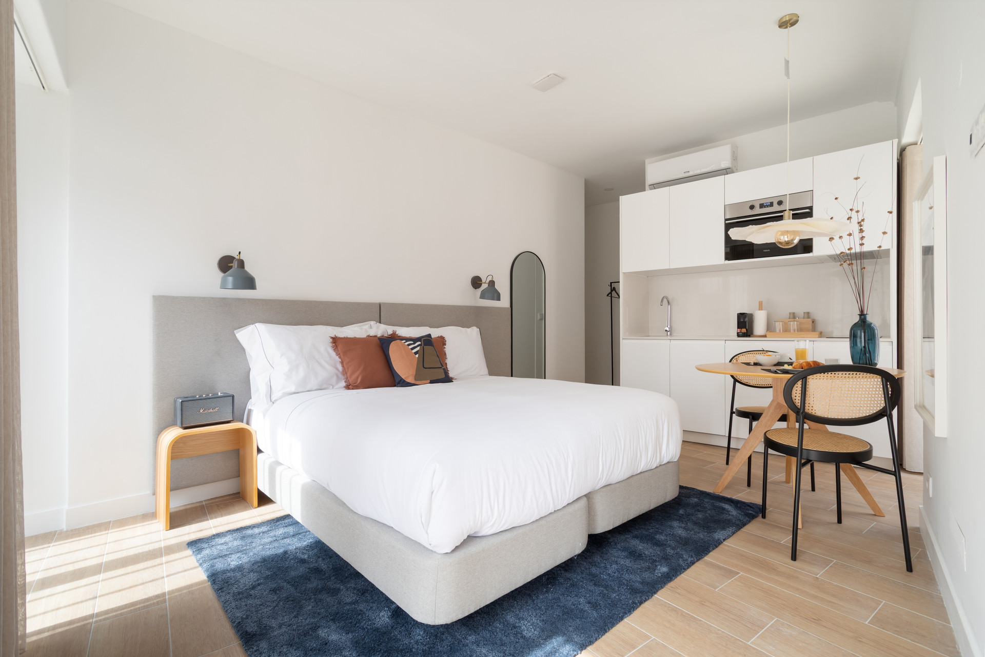 Full studio layout with bed
