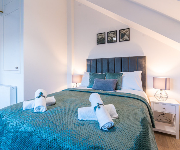 Double bed with bedside tables