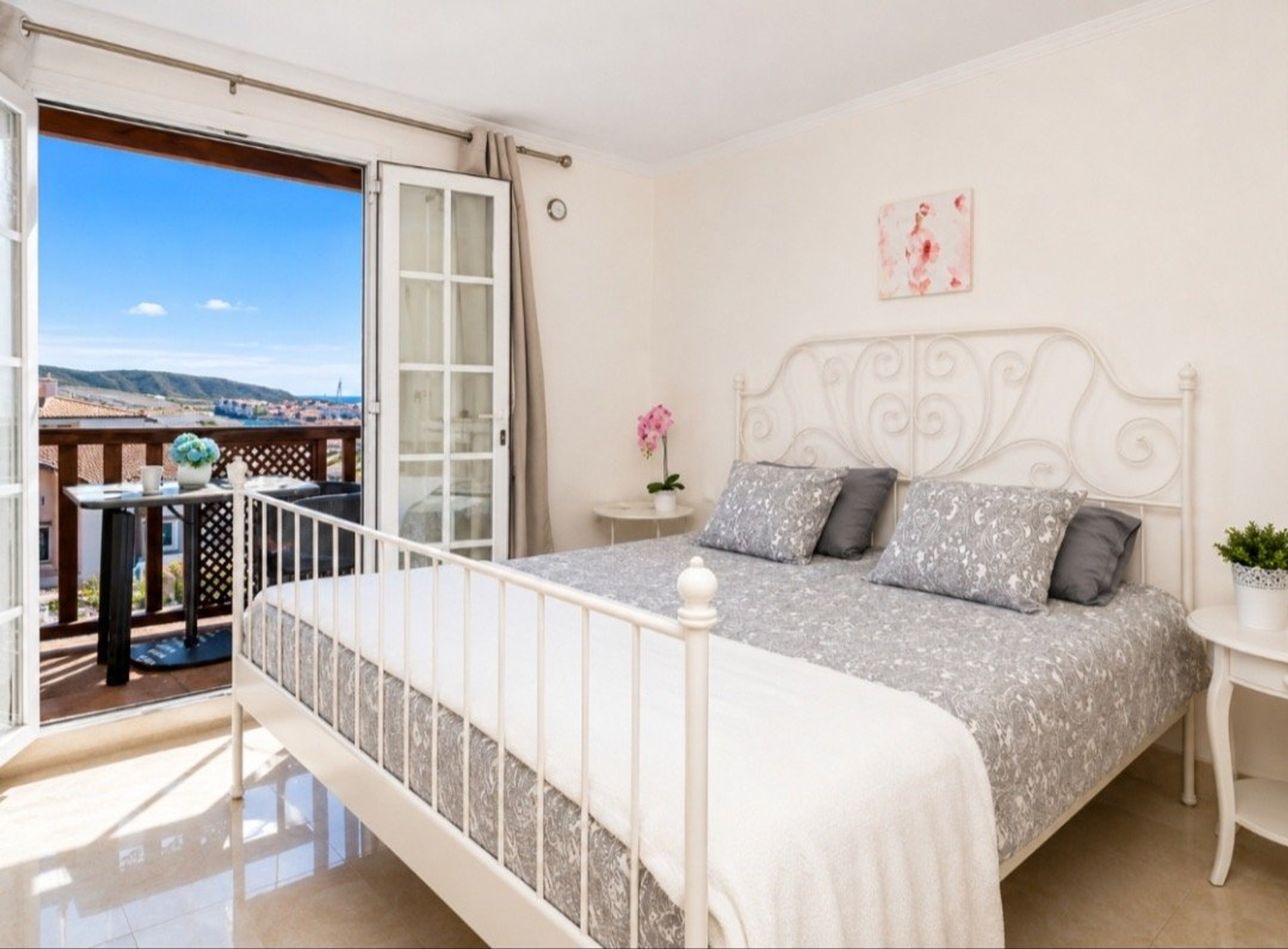 Master bedroom with balcony access