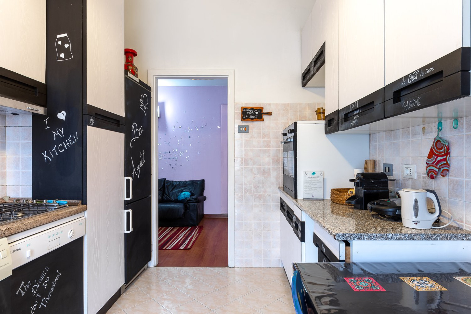 Kitchen with chalkboard cabinets