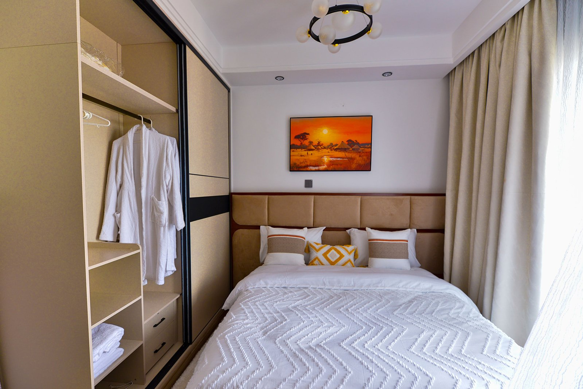 Bedroom with wardrobe and robe