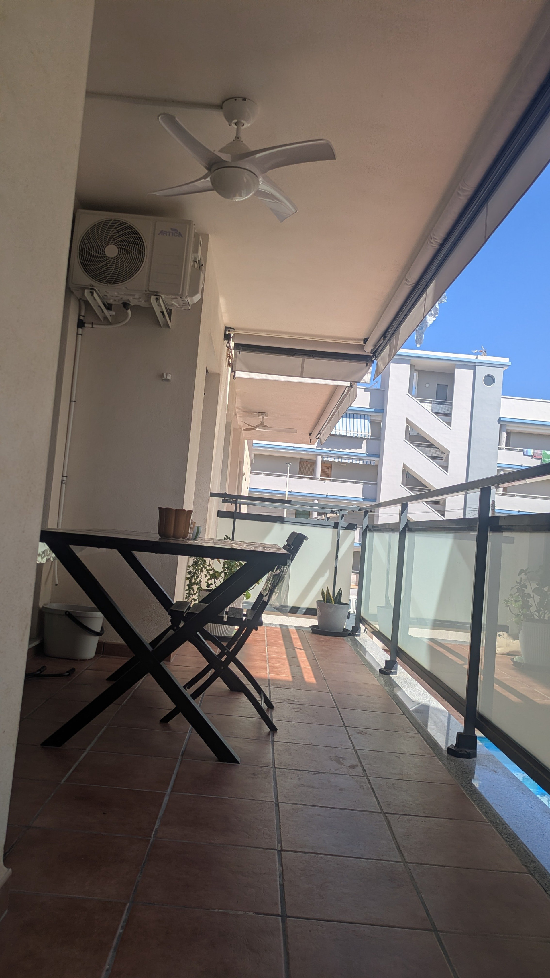 Sunny balcony with table