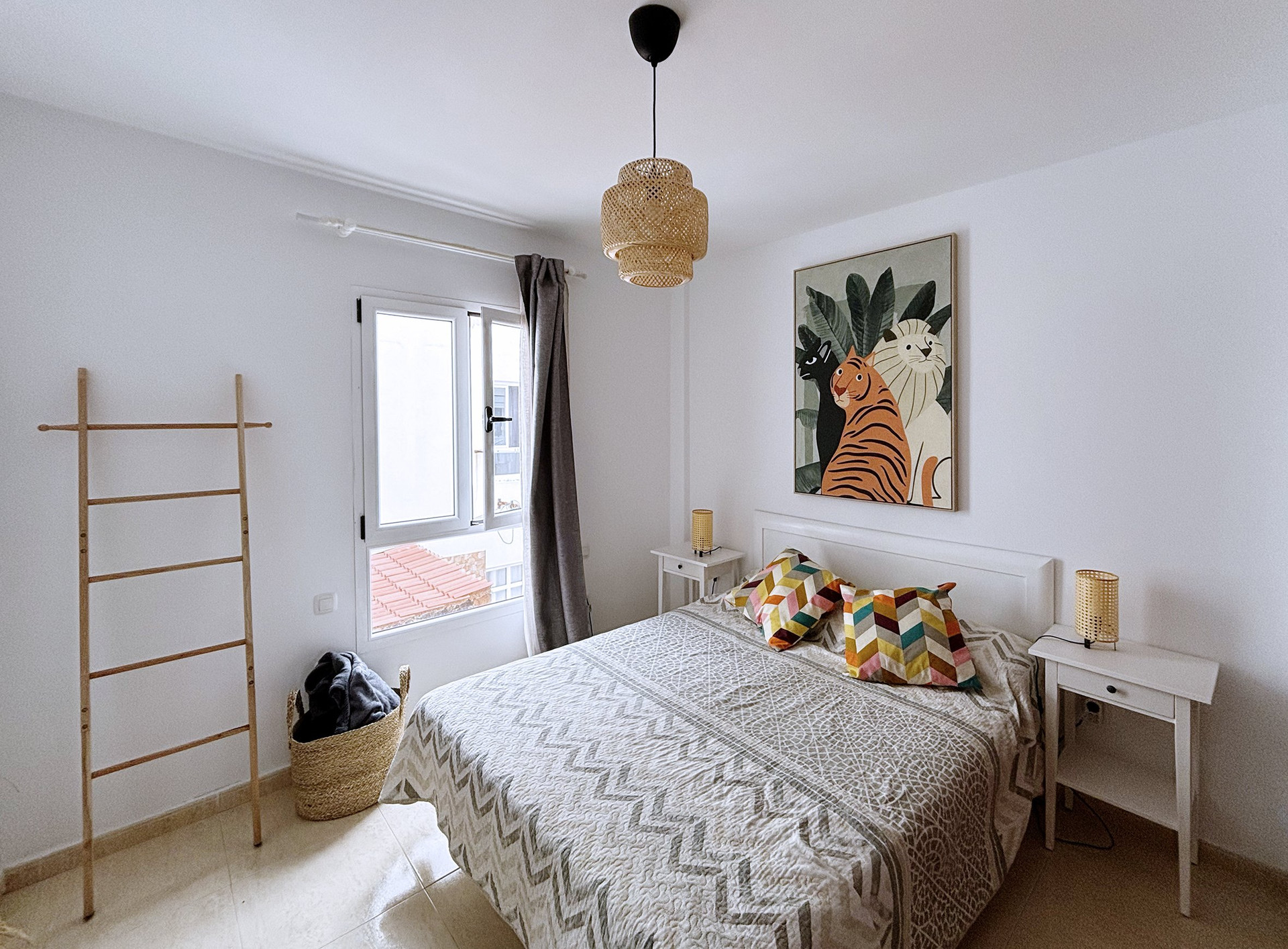 Bright bedroom with double bed