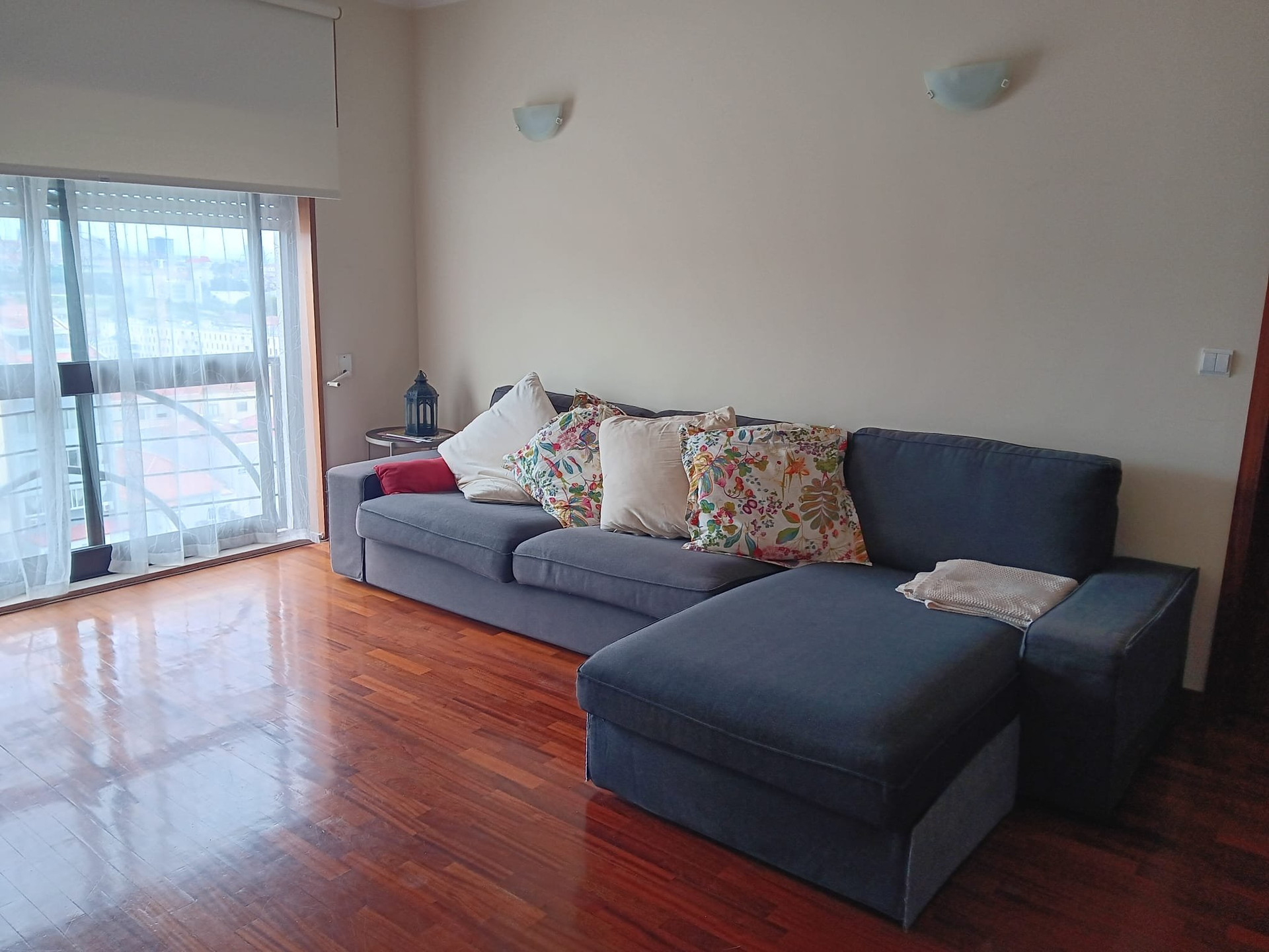 Living room sofa with balcony view
