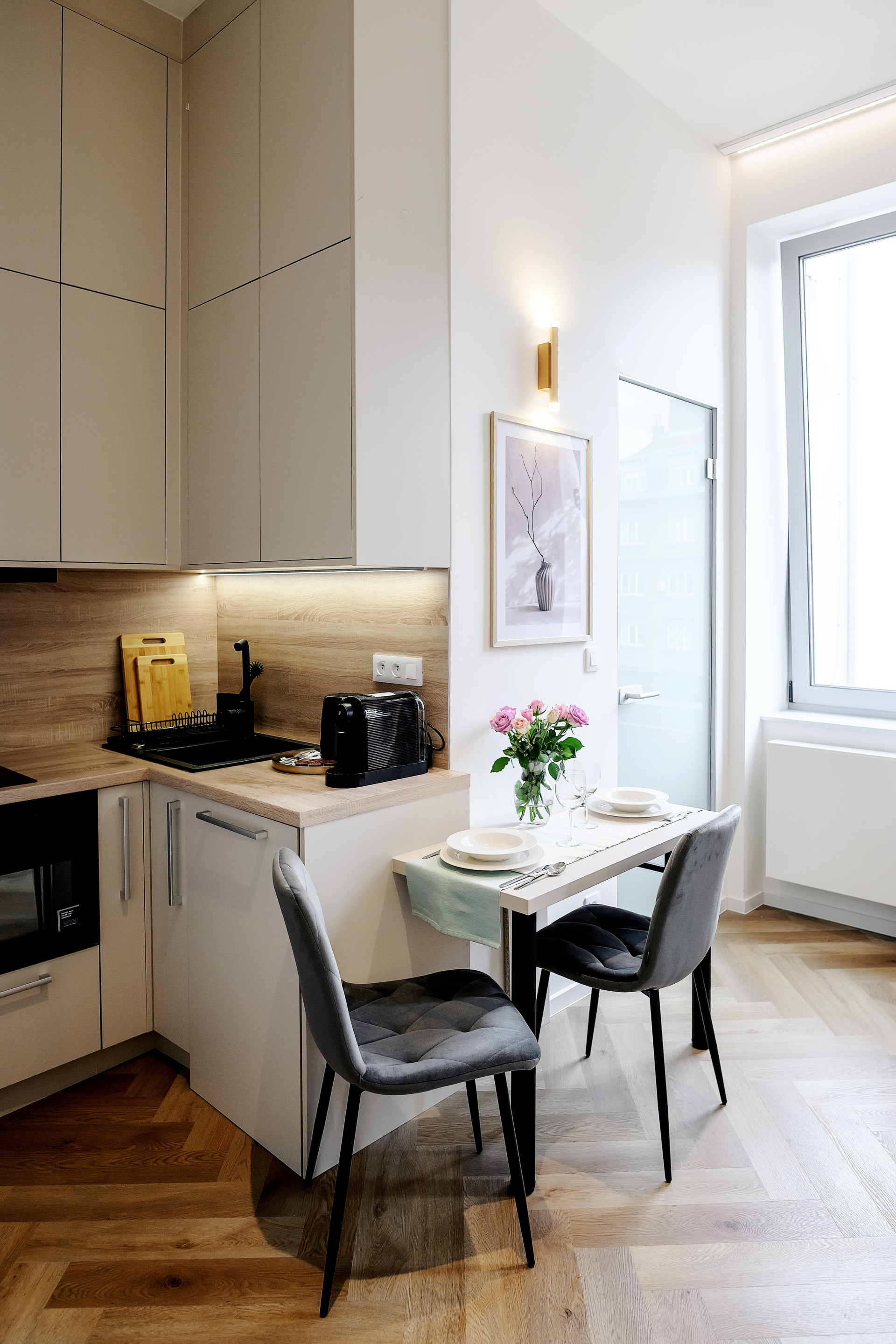 Kitchen with dining table and window