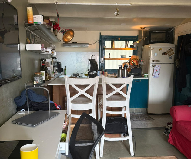 Open living area with kitchen counter