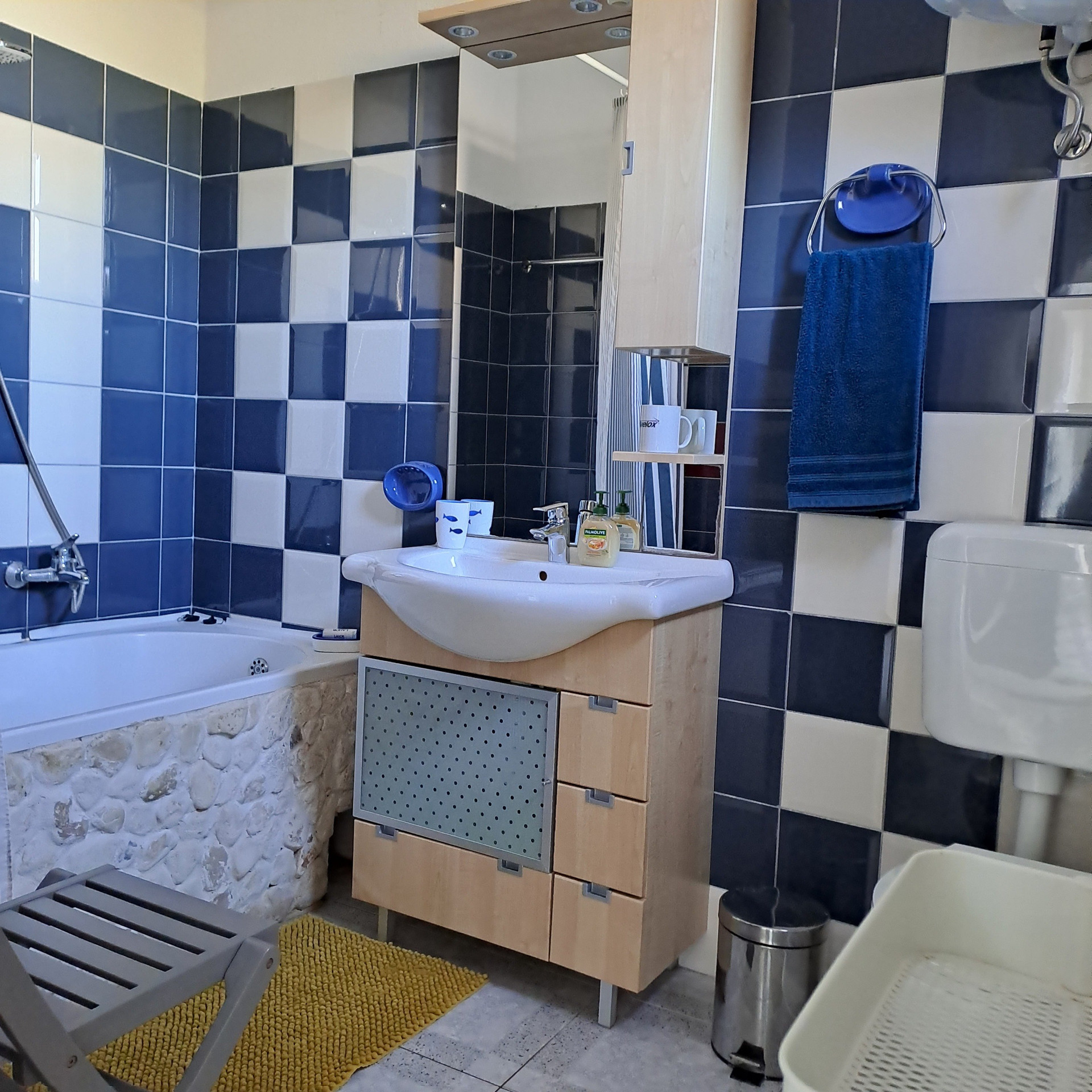 Bathroom with tub and vanity