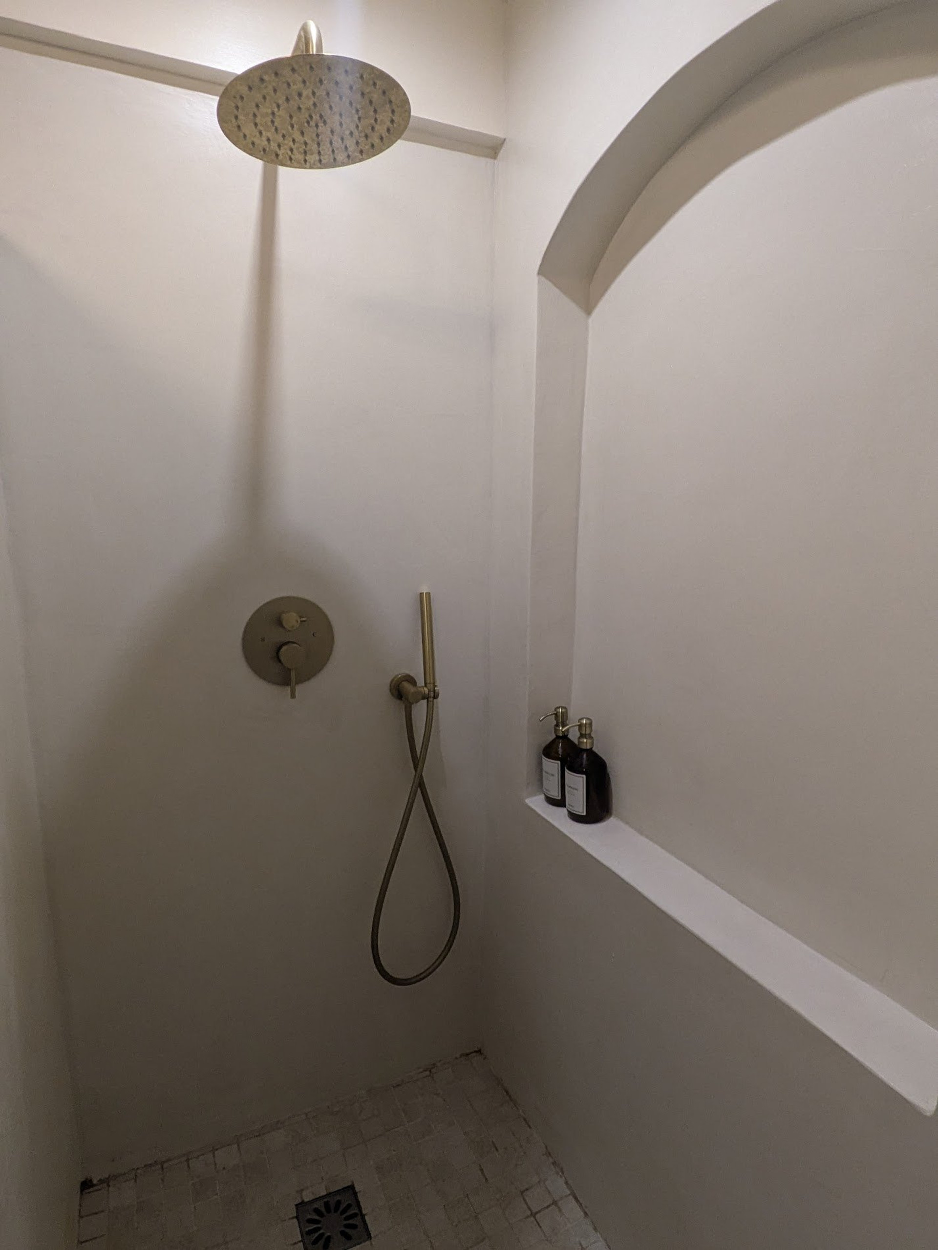 Walk-in shower with rain head