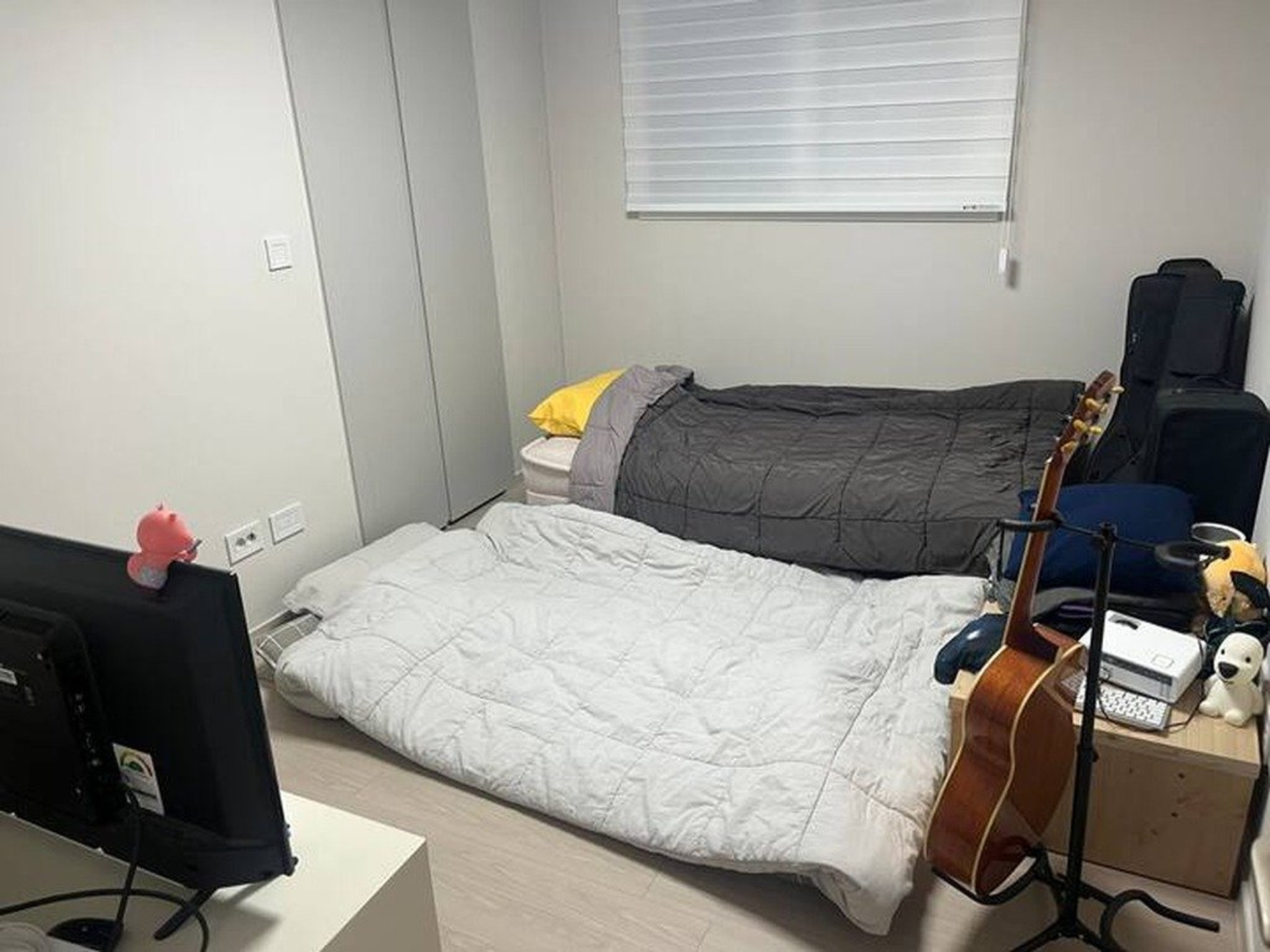 Bedroom with beds and storage