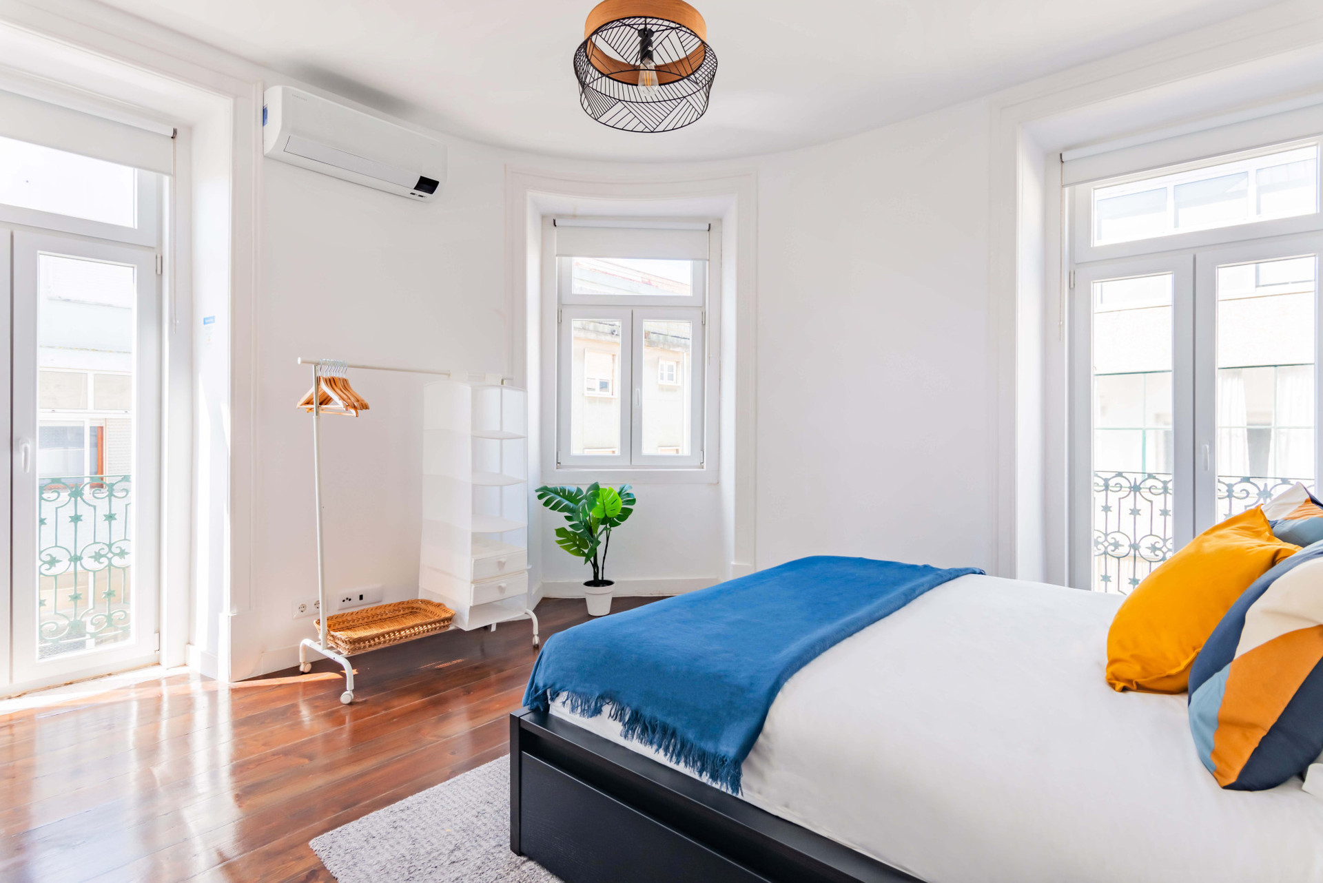 Bedroom with double bed and AC