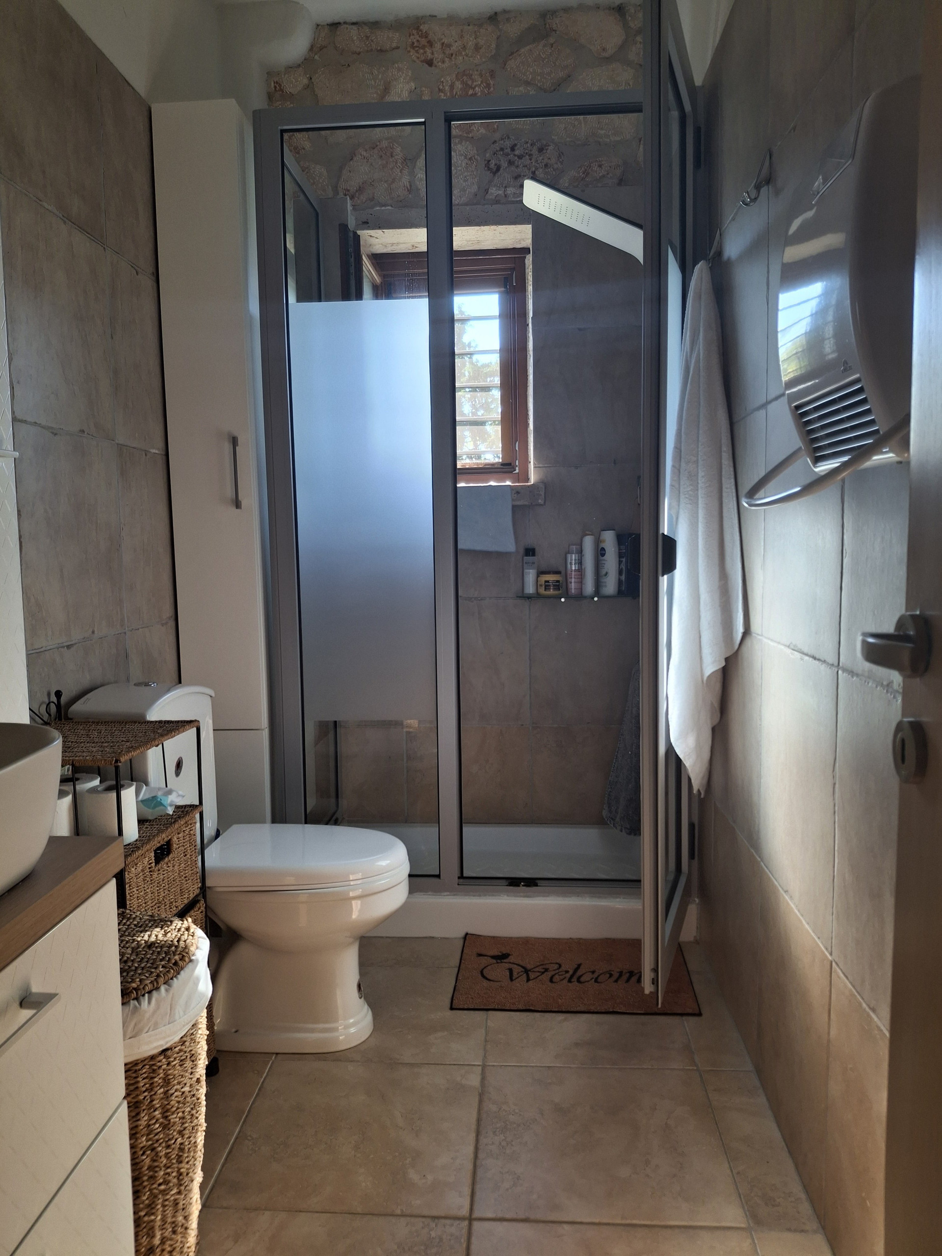 Bathroom with sink and toilet