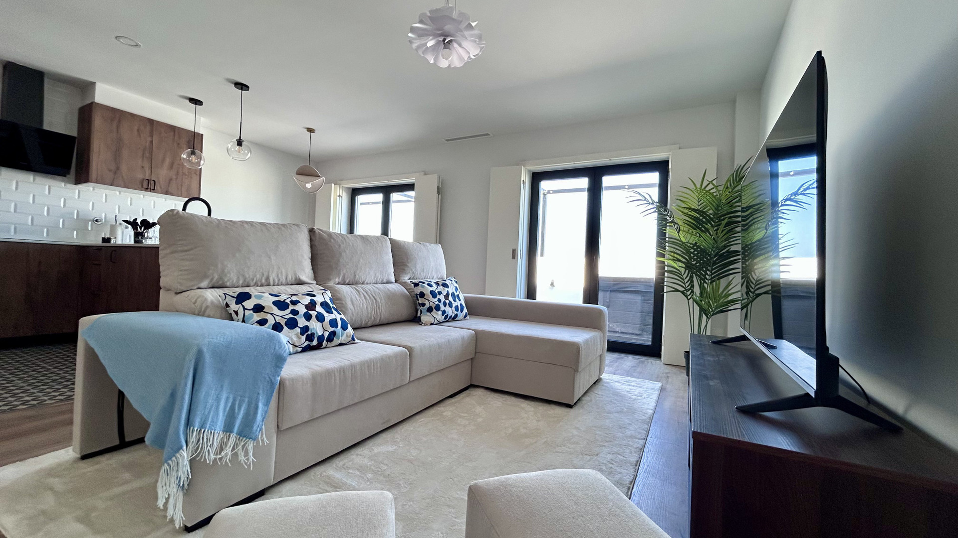 Bright living room with sectional sofa