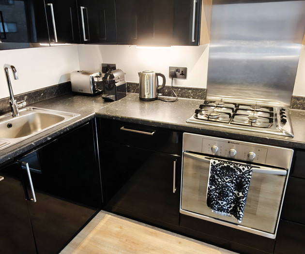 Kitchen counter with hob and oven