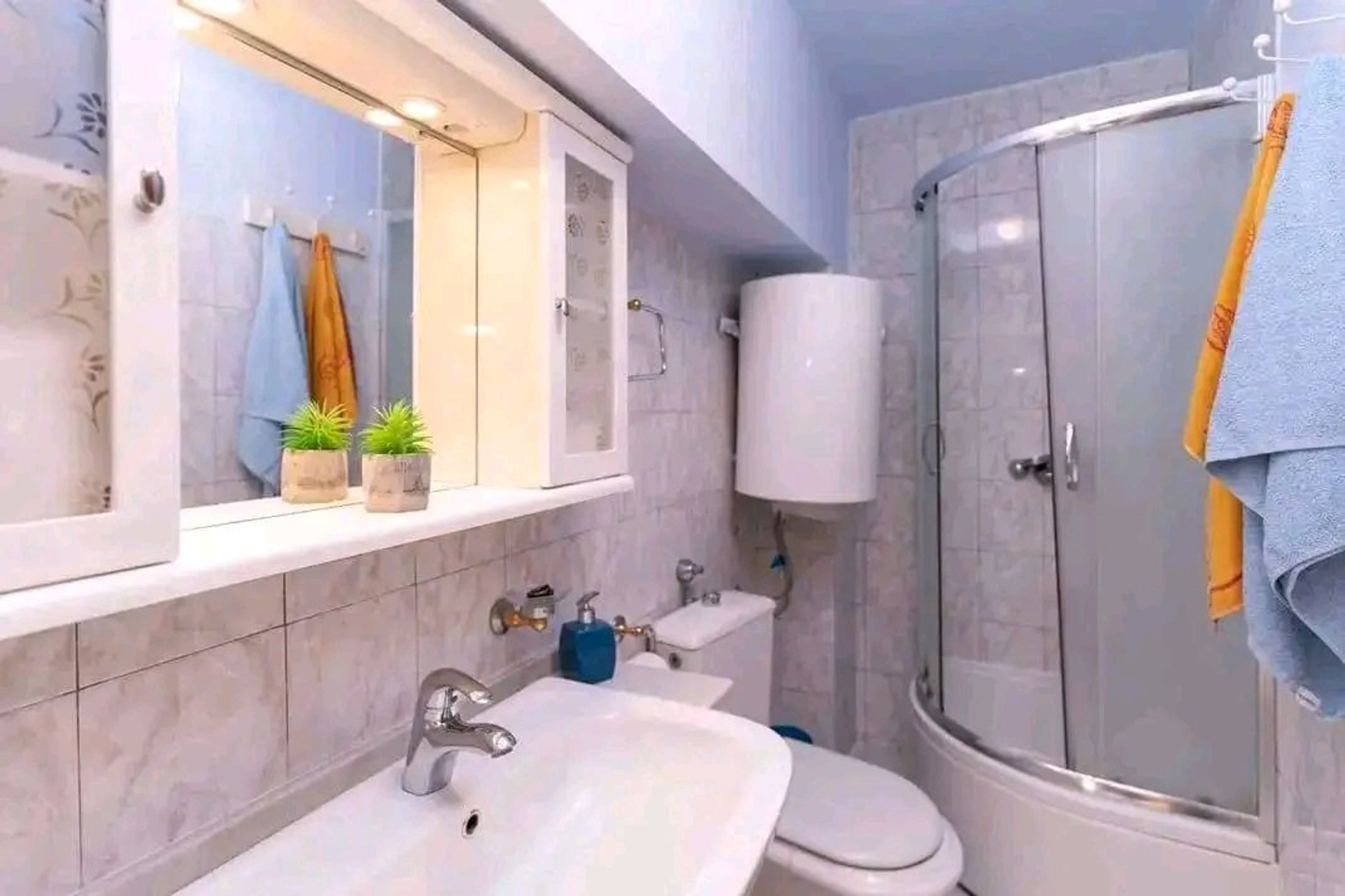 Bathroom with corner shower