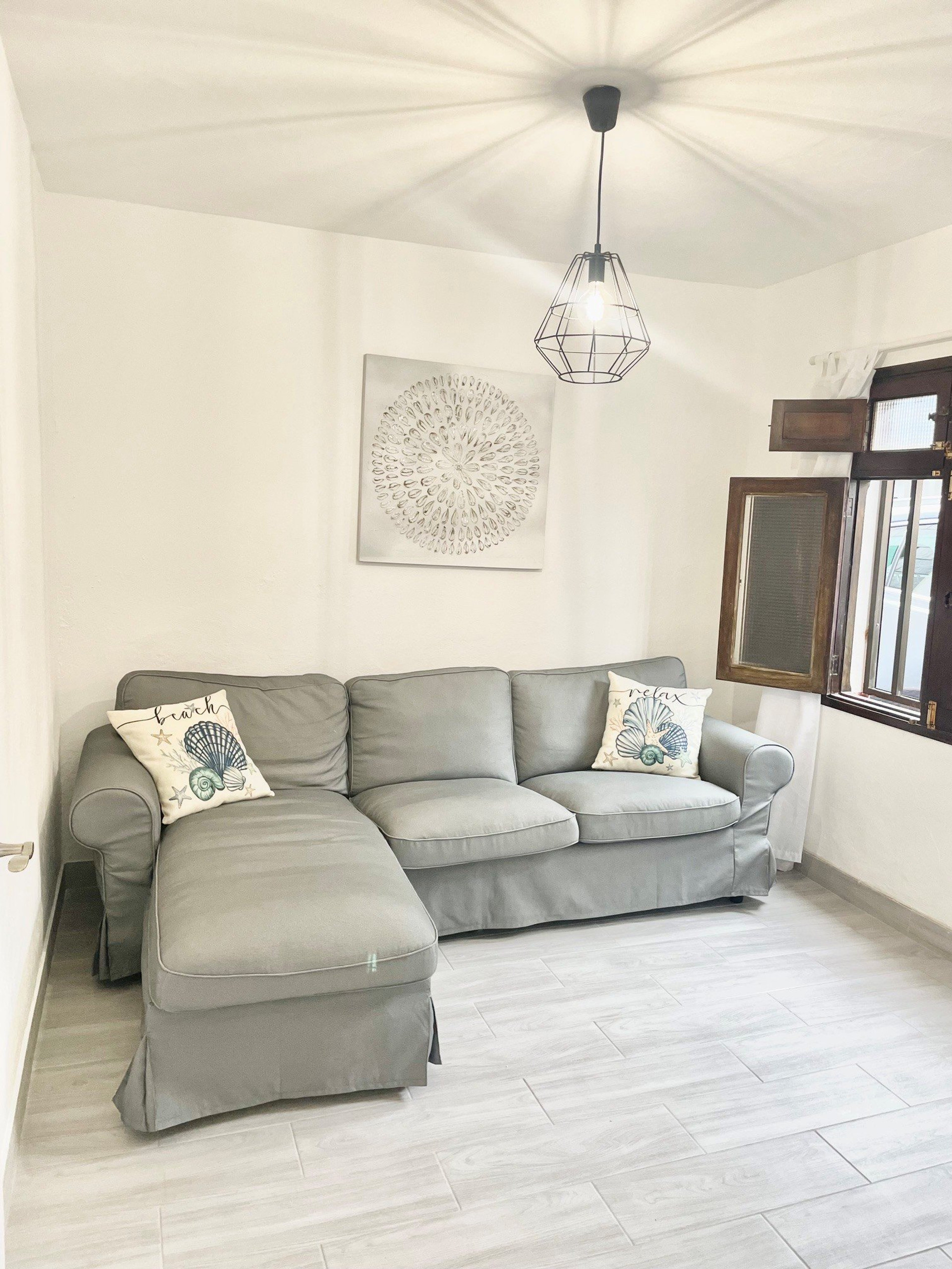 Bright living room with sofa