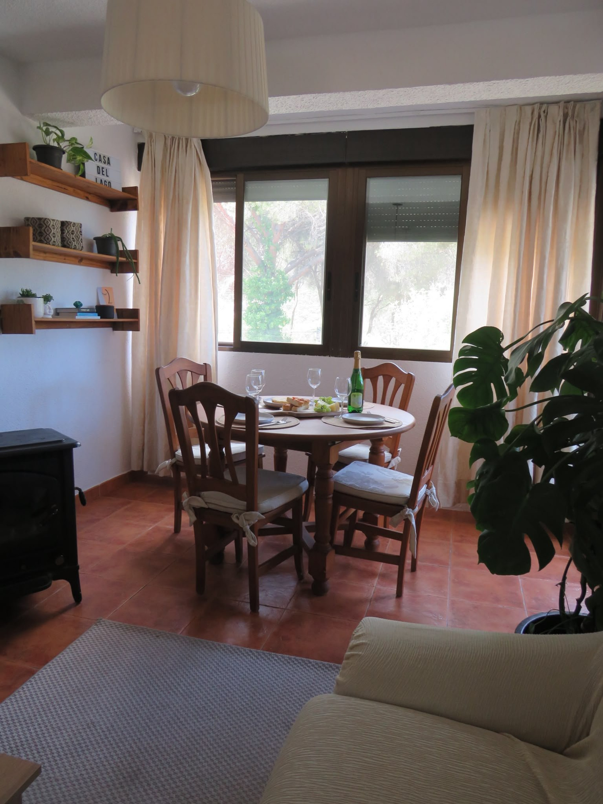 Dining area round table with plants