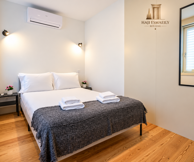 Bedroom with mirror and wardrobe