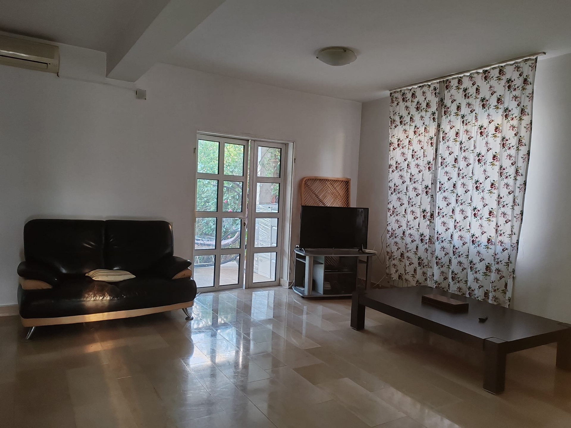 Living room with sofa and TV