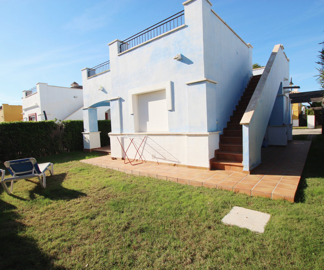 Rear terrace with stairs to roof
